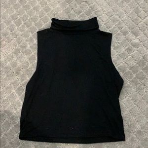 Black sleeveless turtleneck